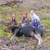 The Nelson family with their moose in Northern British Columbia.